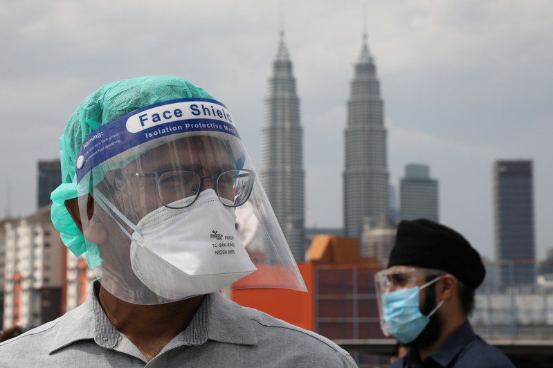 馬來西亞疫情持續升溫。 圖／翻攝自《路透社》