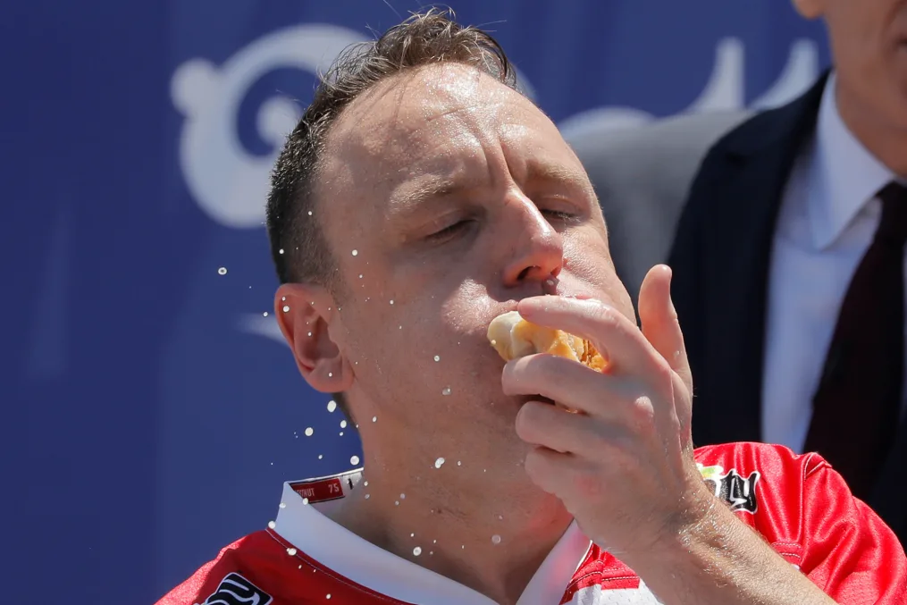 Chestnut competes in the July 4th Nathan’s Hot Dog Eating Contest in 2021.  Andrew Kelly/Reuters