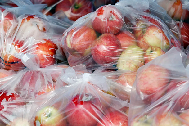 Wrapping foods in plastic wrap are just one of many ways that humans are exposed to food contact chemicals, experts say. Moment RF/Getty Images