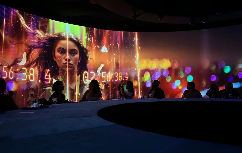 The round room creates a 360-degree immersive experience, with more than 20 projectors showing seamless 3D video graphics. Rebecca Cairns/CNN