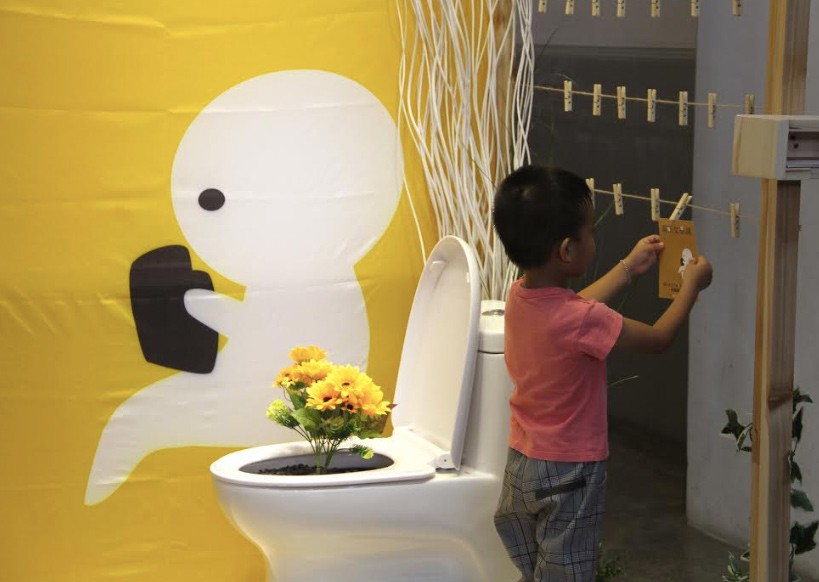 The art installation, Flowers in the Toilet, is a highlight of the exhibition. (NMTL photo)