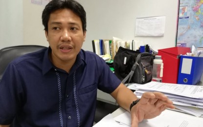 Joecil Mayor, president of the Association of Iloilo Provincial Government Employees (AIPGE), says on Tuesday the bonuses and incentives are meant to reward dedicated employees and encourage them to maintain the performance next year. Photograph: PNA