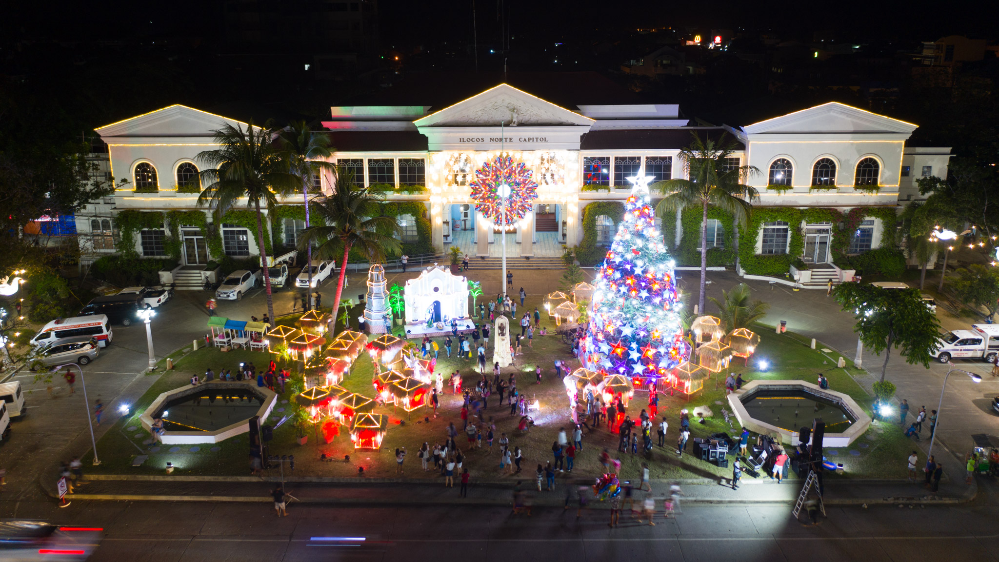 CHRISTMAS TREE MAGNET. A Christmas village at the heart of the city. This year’s Capitol Christmas tree light up features a recycled installation inspired by the Minor Basilica of St. John the Baptist Parish Church. Photograph:the Provincial Government of Ilocos Norte