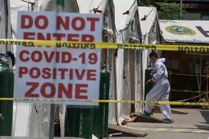 382 more COVID-19 cases detected in the Philippines. Image courtesy of AFP. 