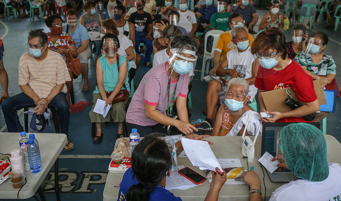 At least 33 Bulacan town hall workers infected with COVID-19 in the Philippines. Image courtesy of ARAB NEWS, AFP.